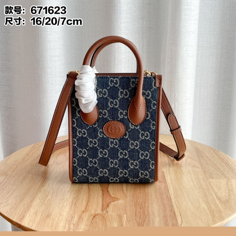 G*u*i top handle bags